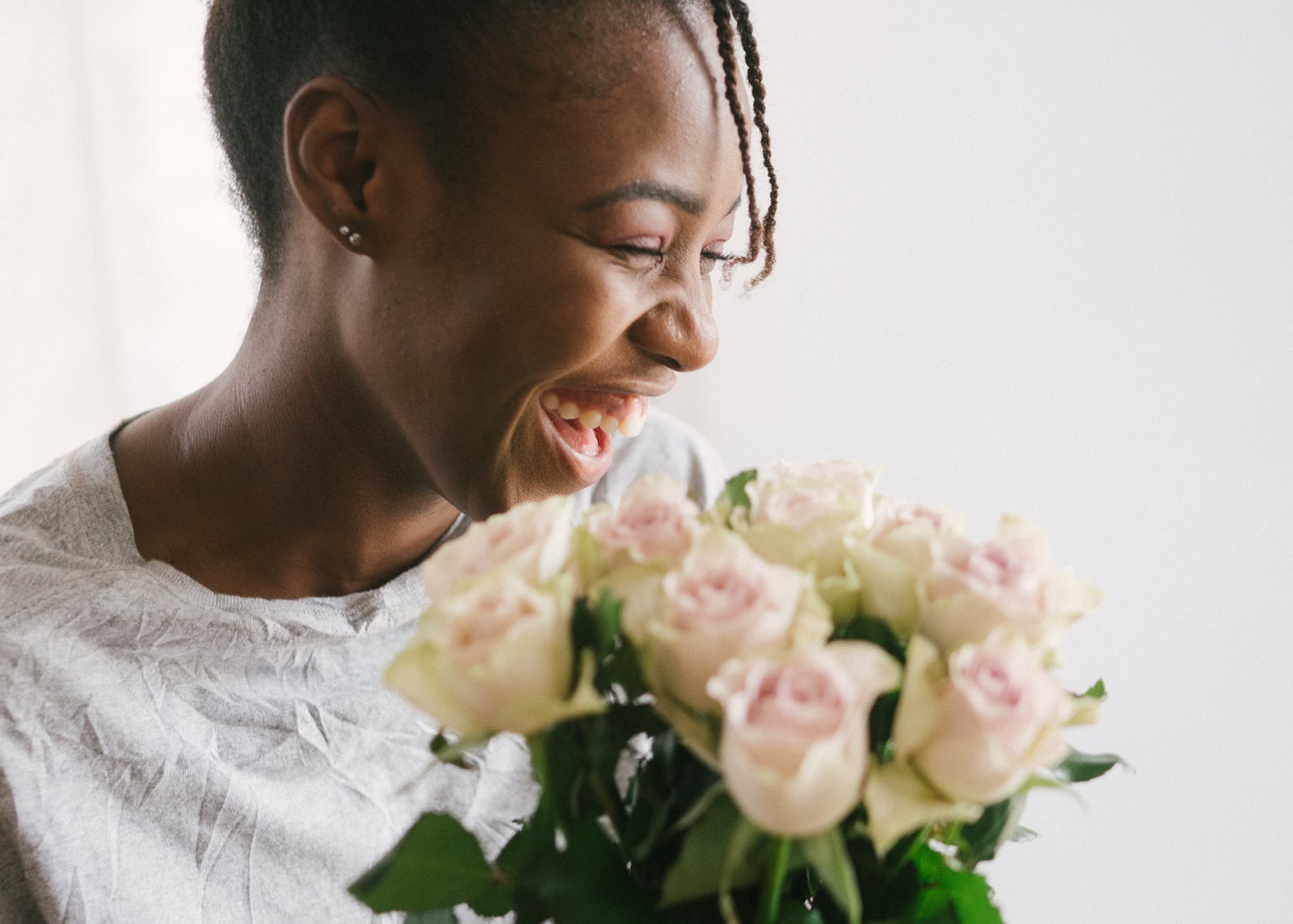 woman holding white flower bouquet
