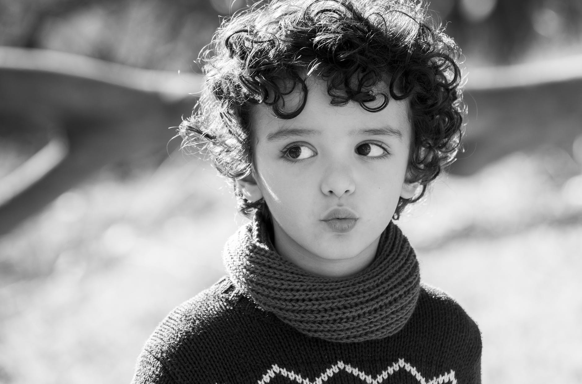 black and white blur child close up